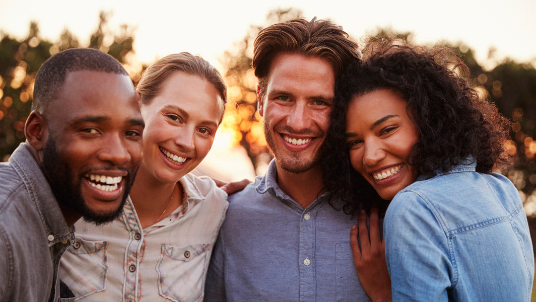 Group of four people being affectionate