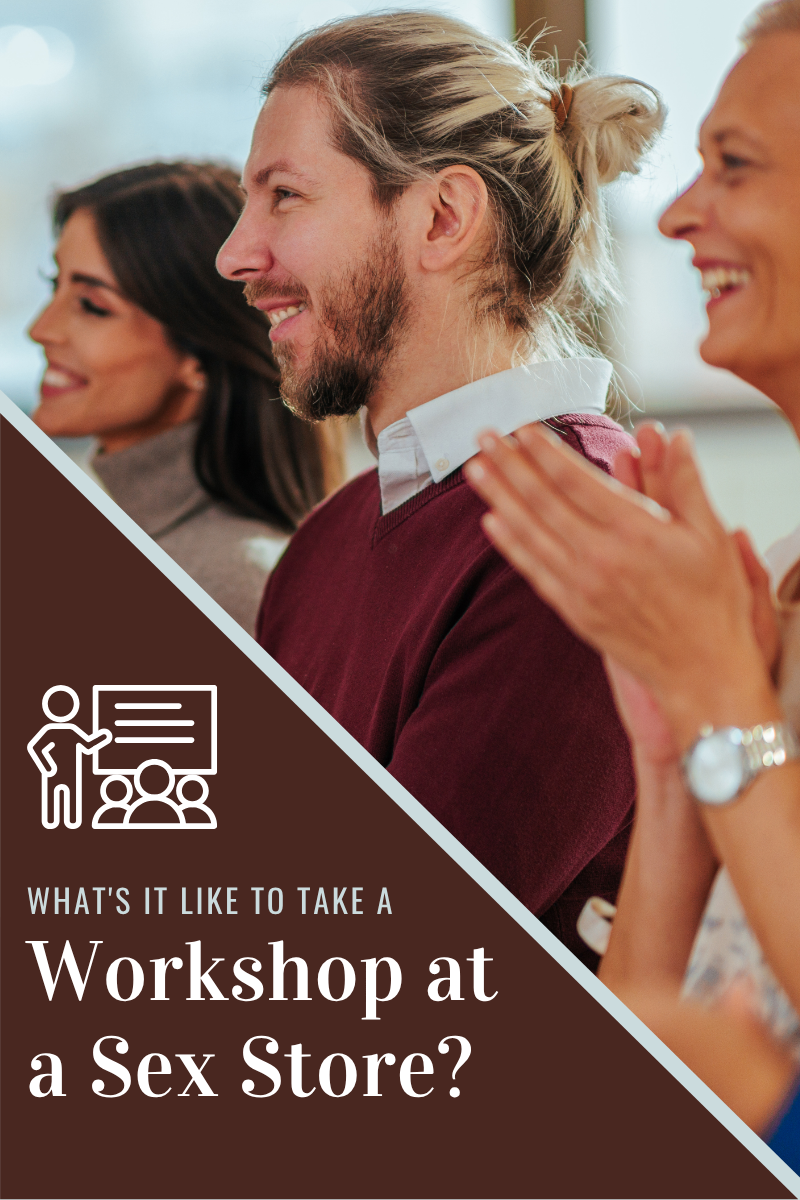 Group of workshop participants smiling and applauding