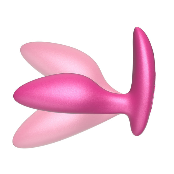 pink silicone butt plug with shadows above and below the insertable end. meant to show that the plug is flexible