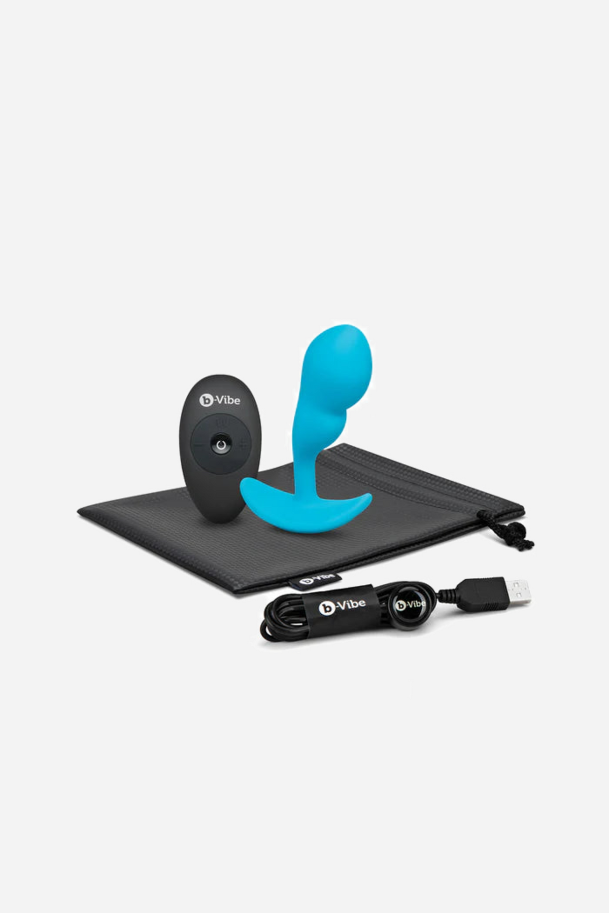 Everything in the box: the teal plug, black remote, storage pouch and USB charging cable