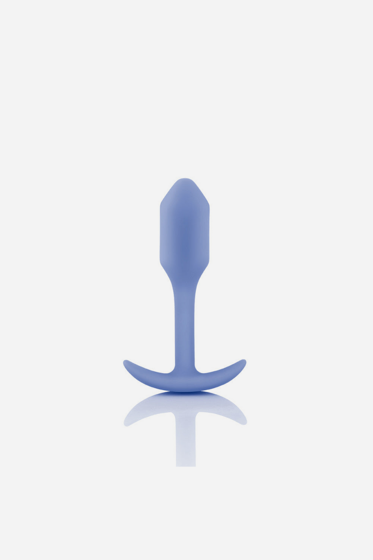 Lilac B-Vibe Snug Plug 1 small weighted butt plug standing upright on its flared base, showing the smooth silicone body and slim neck