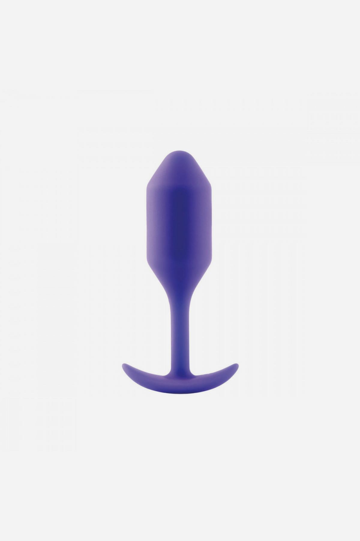 B-Vibe Snug Plug 2 in purple standing upright, showing the weighted torpedo-shaped bulb, slim flexible neck and wide flat base on grey