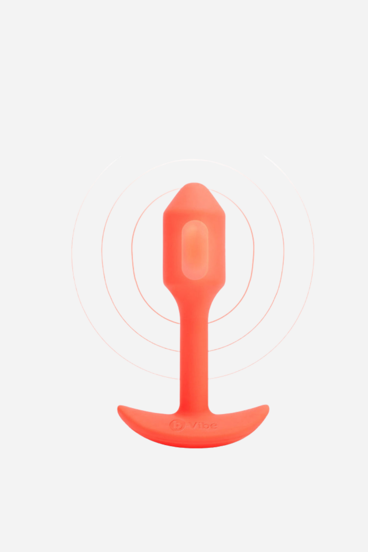 Orange B-Vibe Vibrating Snug Plug 1 small, a weighted silicone butt plug with a flared base, shown upright with vibration lines on grey