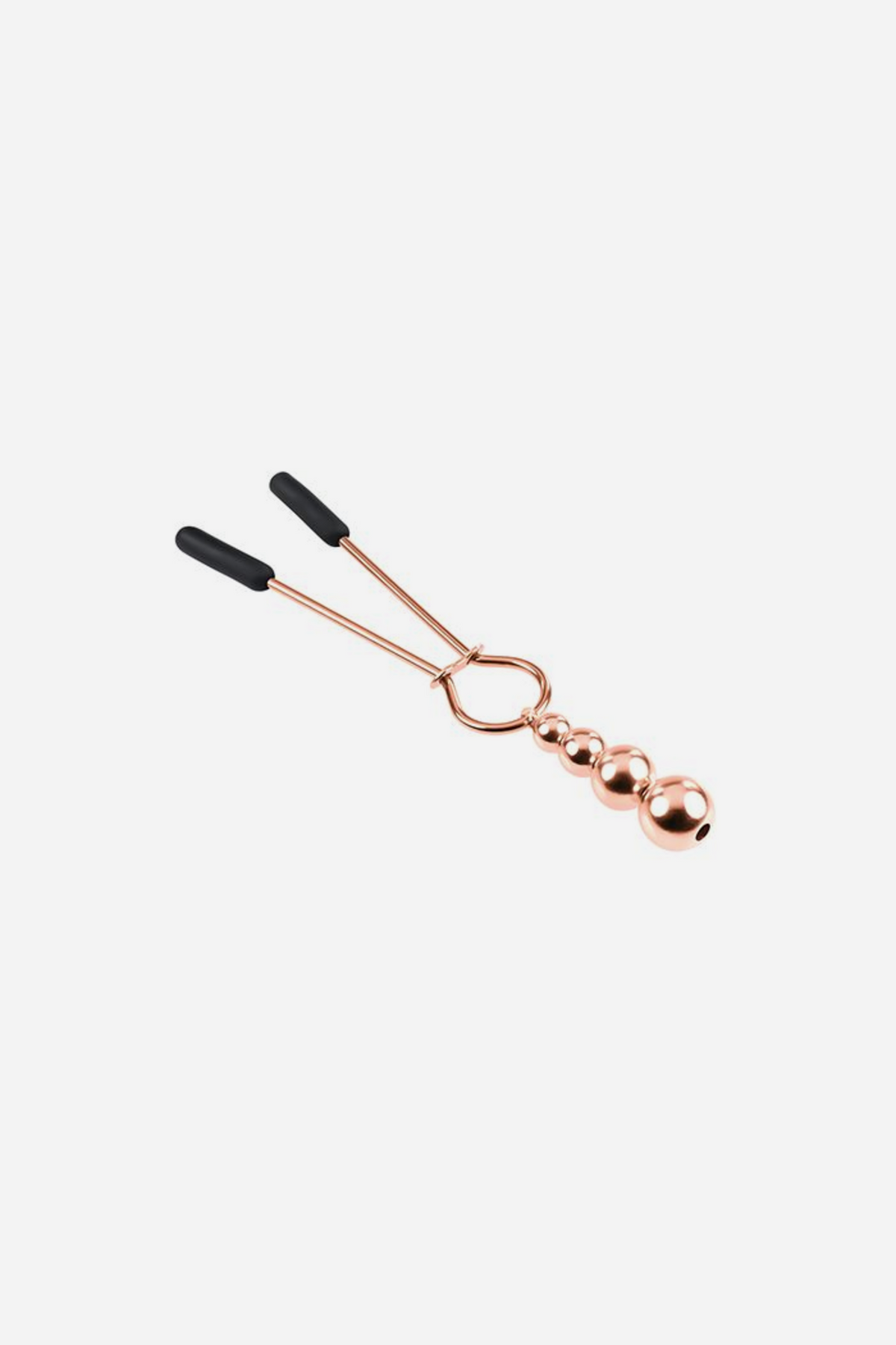 Single rose gold tweezer nipple clamp shown open at an angle, with rubber-tipped jaws, slide ring and beaded weight, on grey