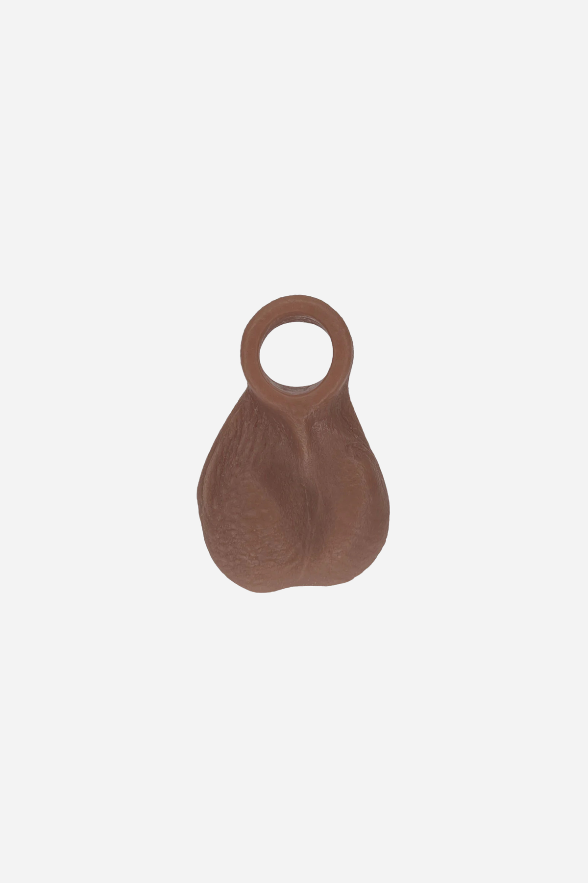 Ball Bump attachment cock ring in Hazelnut, front view of the realistic textured balls with the stretchy ring on top, on light grey
