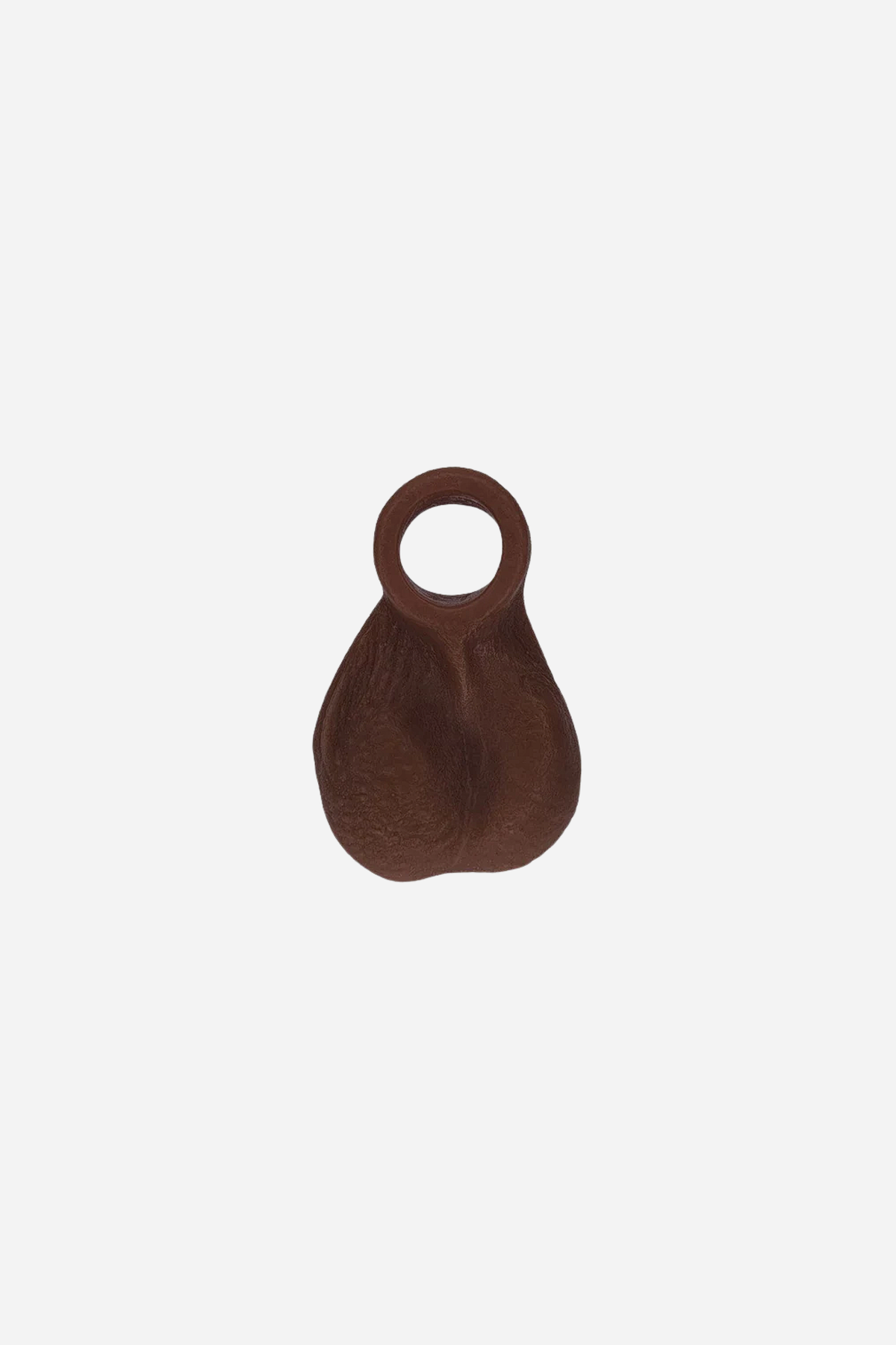 Ball Bump attachment cock ring in Chocolate, front view of the realistic textured balls with the stretchy ring on top, on light grey
