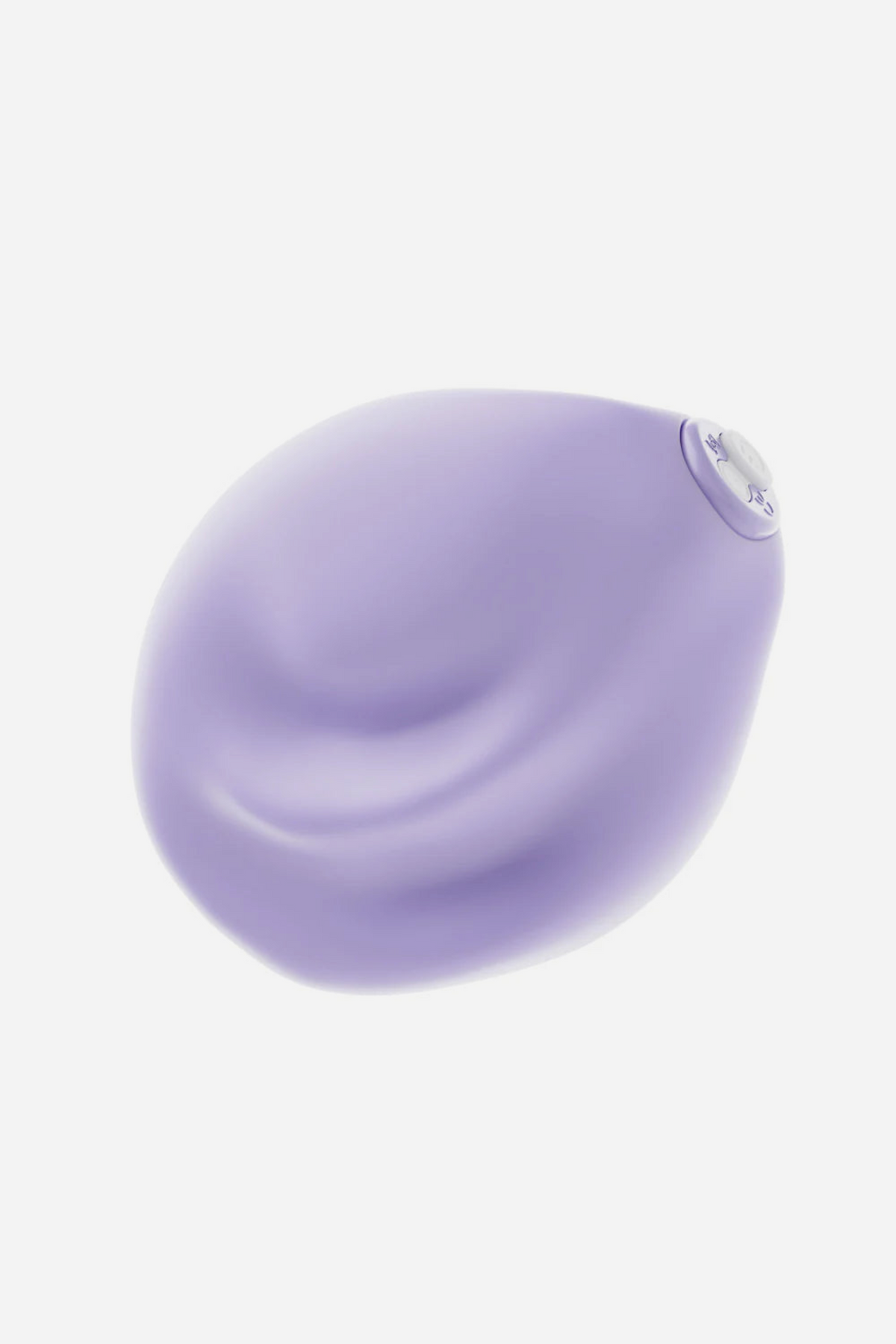 Top view of the lavender Be Urself Vibrating Pulse Pad highlighting the satin-smooth UltraSilk finish, raised ridges and on-board control button