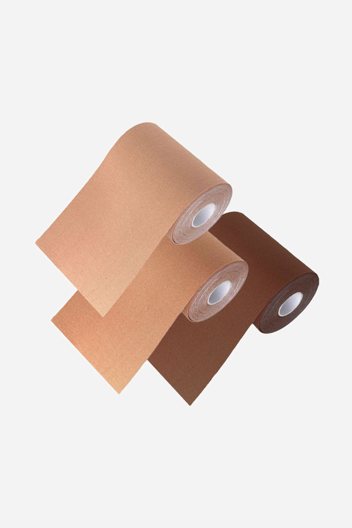 Three rolls of binding tape in beige, caramel and chocolate, partly unrolled and stacked