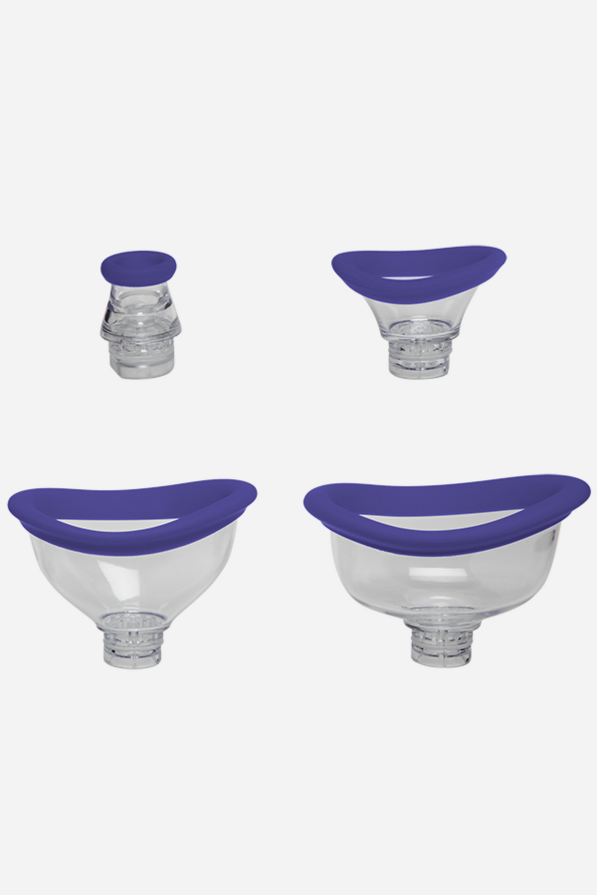 The four interchangeable clear suction cups with soft purple silicone rims included with the Bloom pump, for clitoris, vulva and nipples