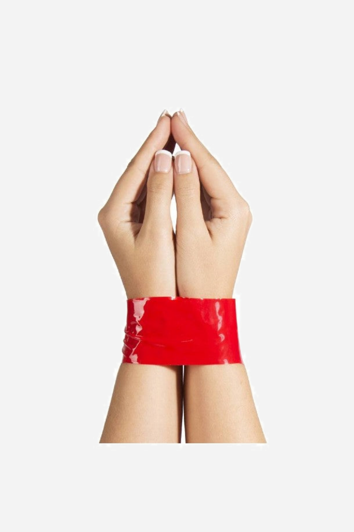 Two hands pressed palm to palm and bound at the wrists with a wide band of red bondage tape, fingers relaxed and pointing upward.