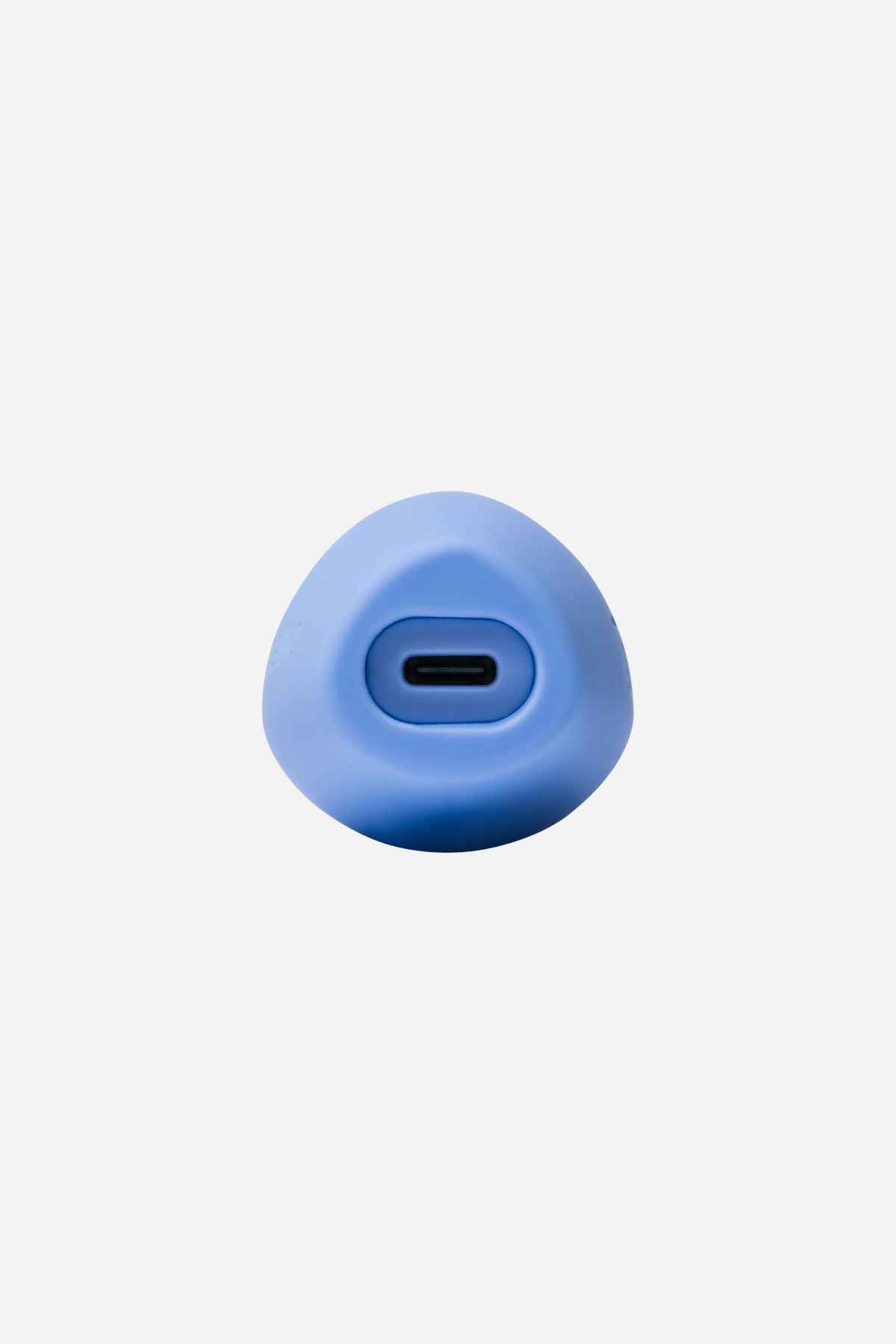 Base of the periwinkle Dame Dip 2.0 palm vibe showing the USB-C charging port set into its smooth, rounded silicone end