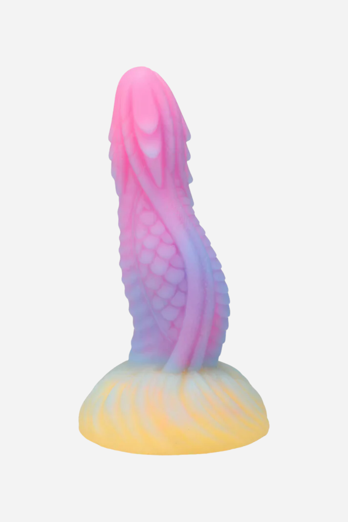 Dragon's Tongue fantasy dildo with a scaled ridged shaft that fades from pink at the tip through lilac and blue to a pale yellow base.