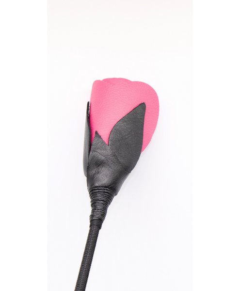 top down view of the petals on the pink rose tip of the kinky leather crop