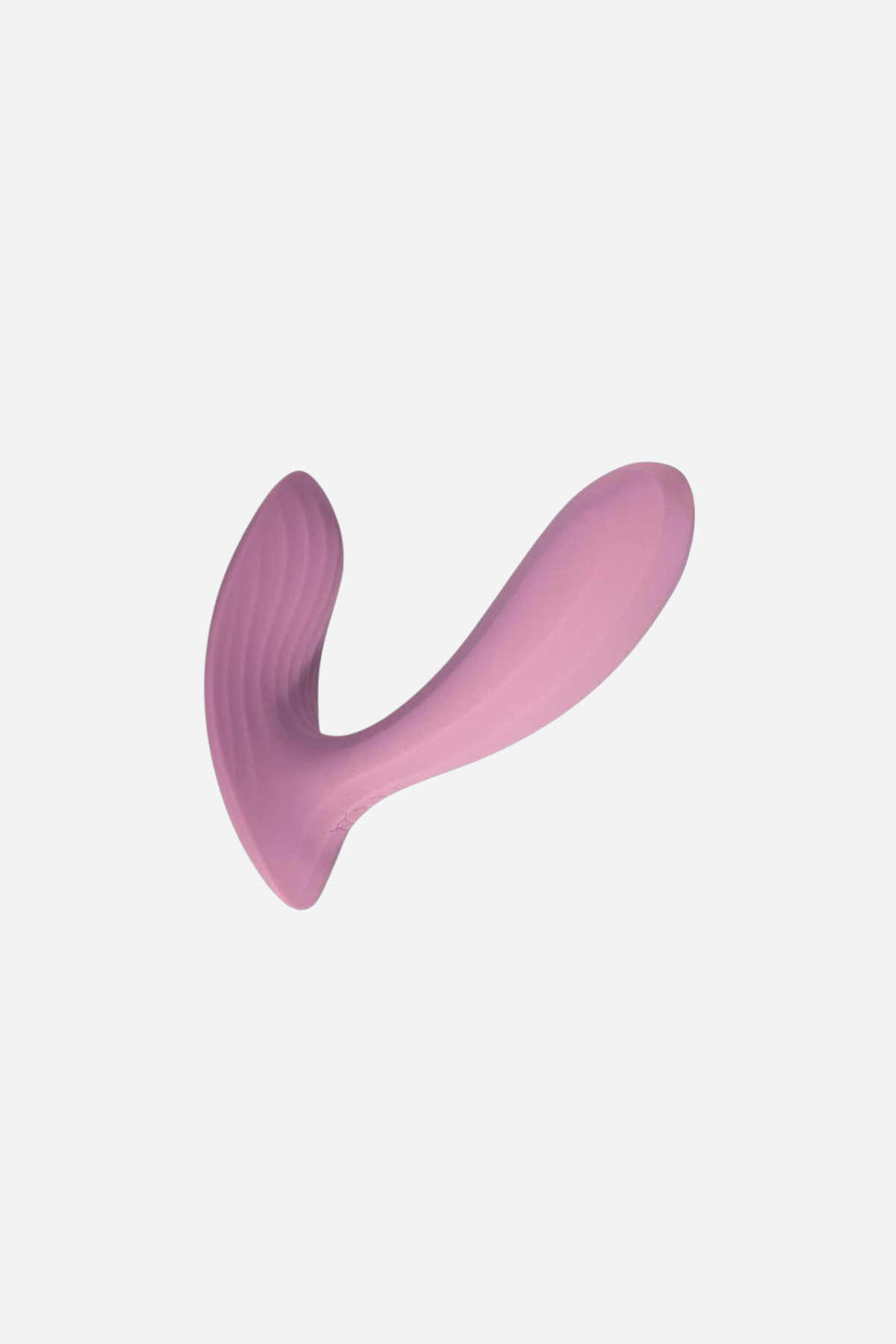 Dusty pink Erica wearable plug vibe standing on a plain grey backdrop, its slim curved arm sweeping up from a tapered internal plug.