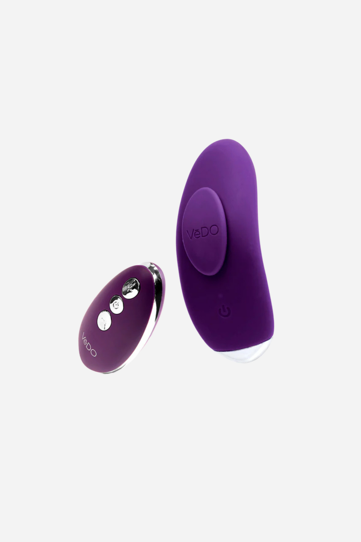 The purple Flexi Niki remote and vibe lying flat side by side on grey, the remote's three buttons set in a row down its centre.
