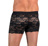white male model in size medium faces away from camera to show off the see through lace men's lace boxers