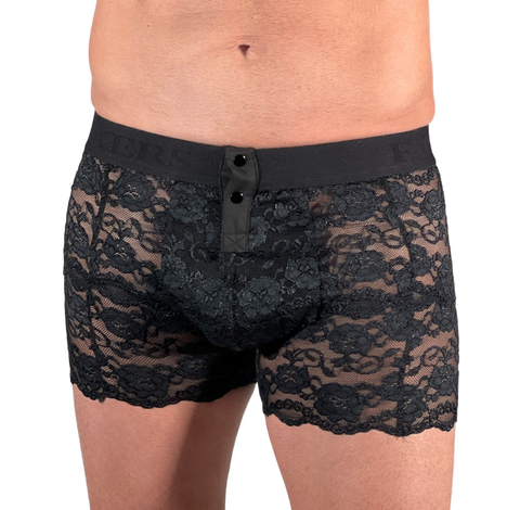 white male model with bulge is wearing black lace boxers with two front snaps and a thick black waistband