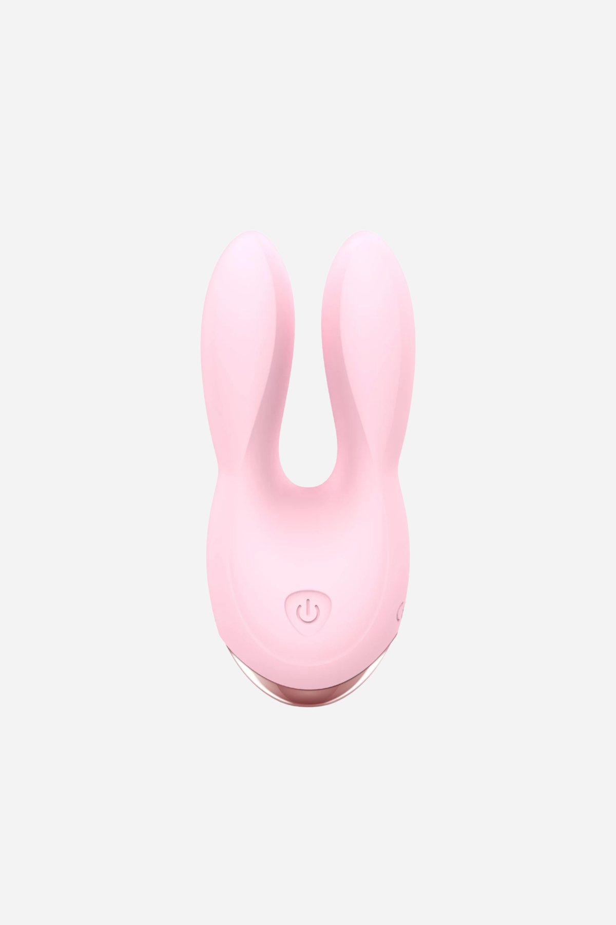 The rabbit ears vibe in pale pink, a rounded silicone body with two soft flexible prongs at the top and a single control button below.