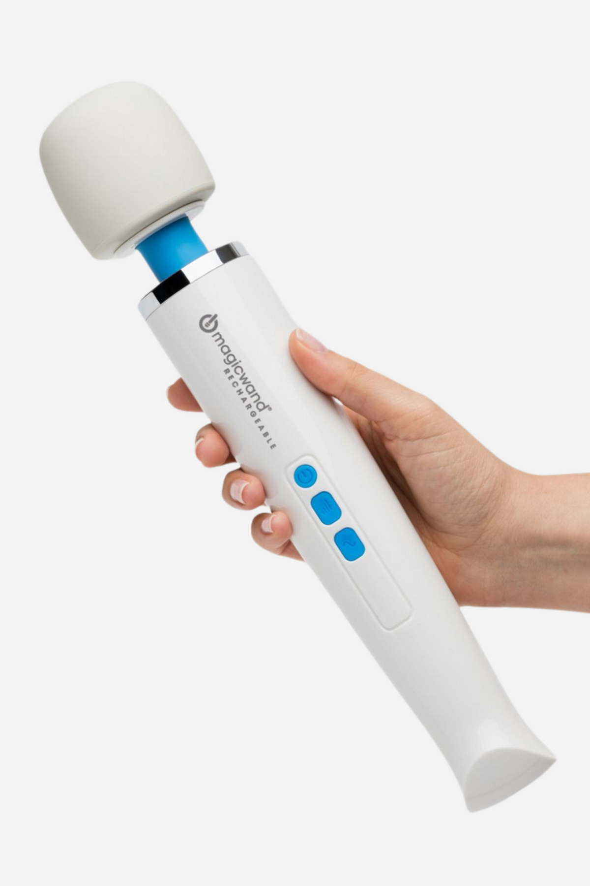A hand holding the white Hitachi Magic Wand Rechargeable by its ribbed handle on grey, the soft round head tilted towards the camera.