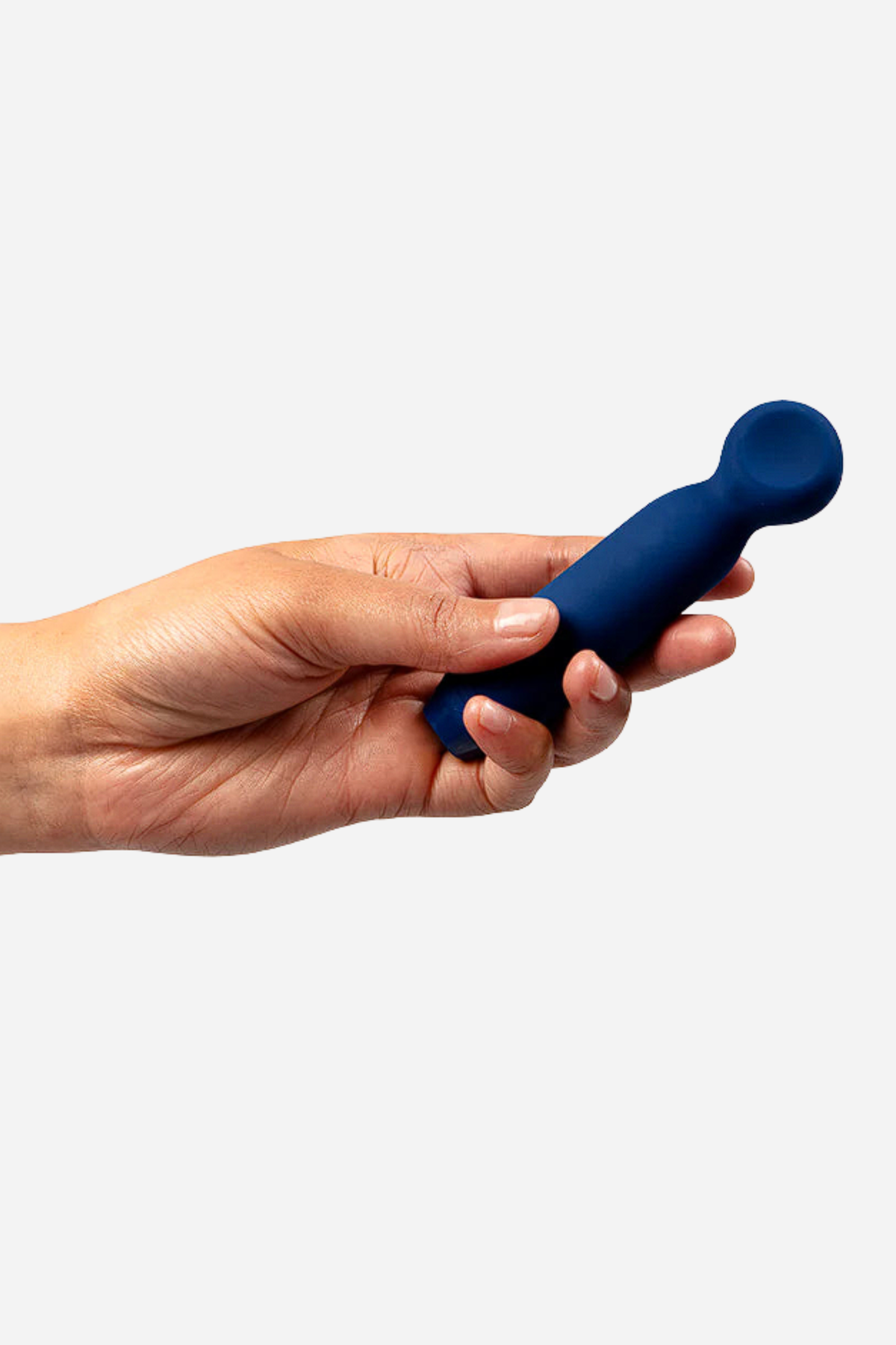 Hand holding the cobalt blue Je Joue Vita Lipped Bullet, showing the flared lipped head that cups the body and focuses the vibration