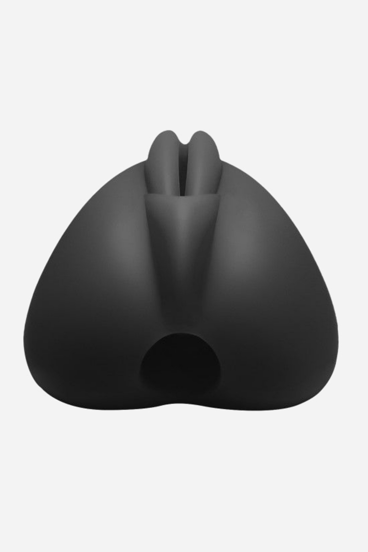 The black Lippi grinding pad seen from behind, showing the flat tacky back panel and the round cavity that holds a bullet vibrator.