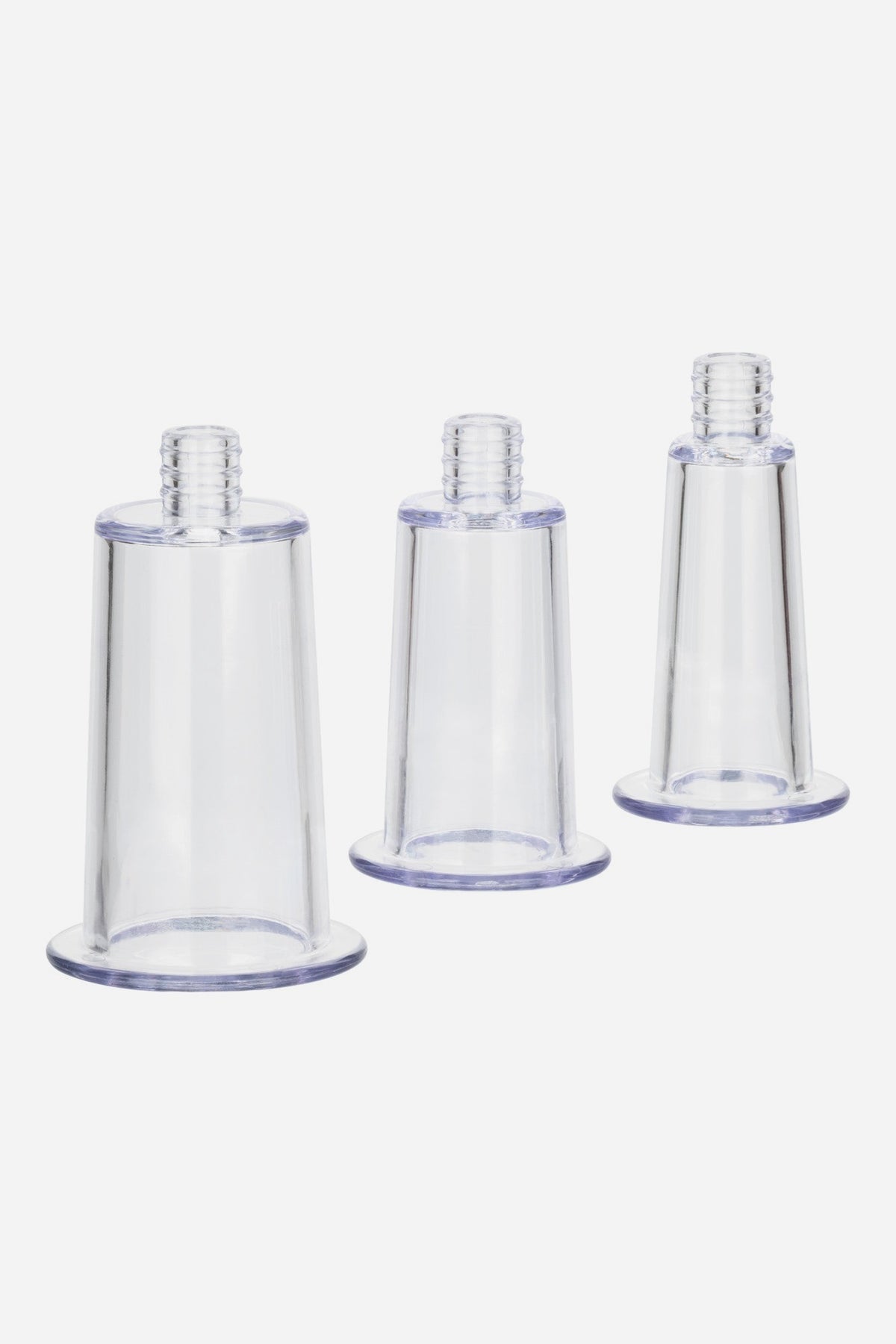 The three clear No Bounds pump cylinders lined up from largest to smallest without sleeves, showing the flared bases and hose connectors