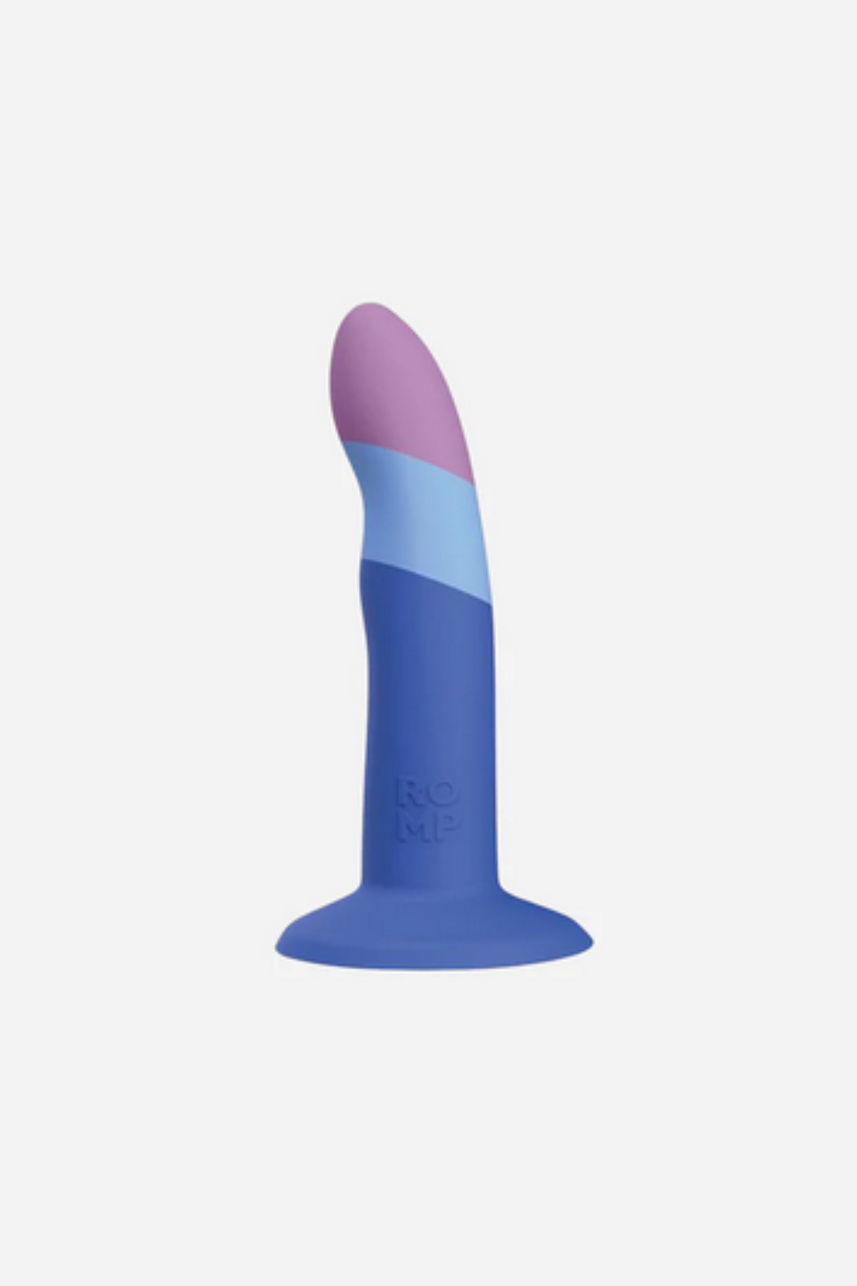 Piccolo pegging dildo in Small standing on its suction cup base, side view of the gently curved shaft with pink tip and blue bands on light grey
