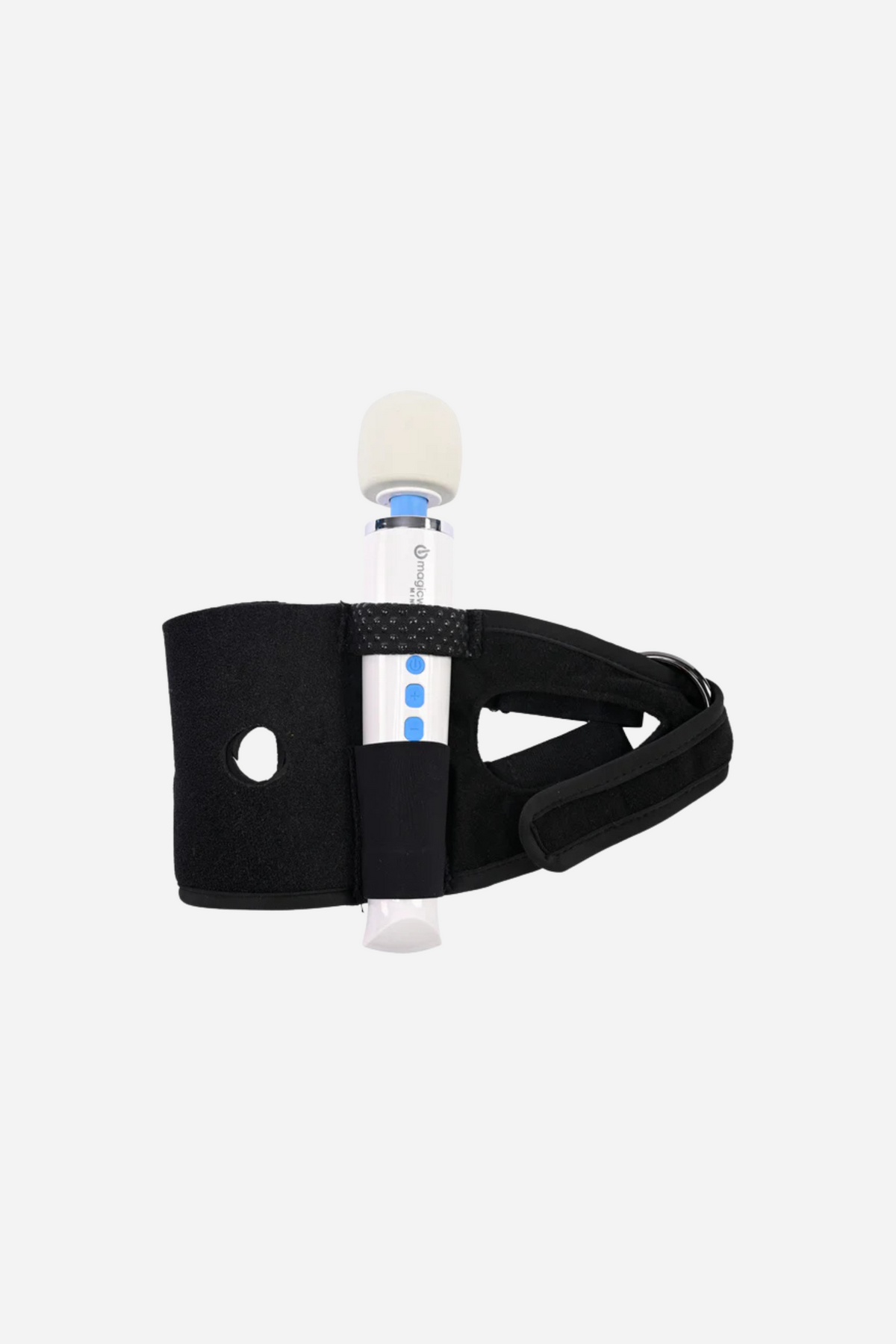 Pivot Forced Orgasm Toy Strap in black with a white wand vibrator secured in its centre pocket, shown laid flat on a light grey background