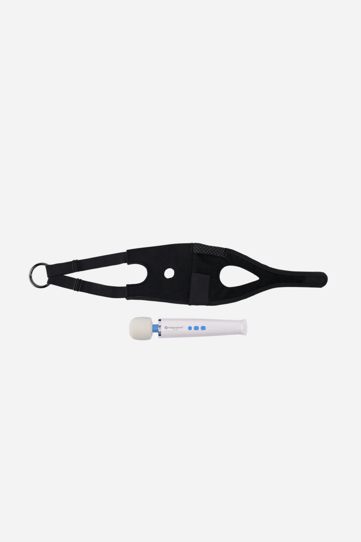 Pivot Forced Orgasm Toy Strap laid flat with a white wand vibrator placed beneath it, ready to be slotted into the centre pocket