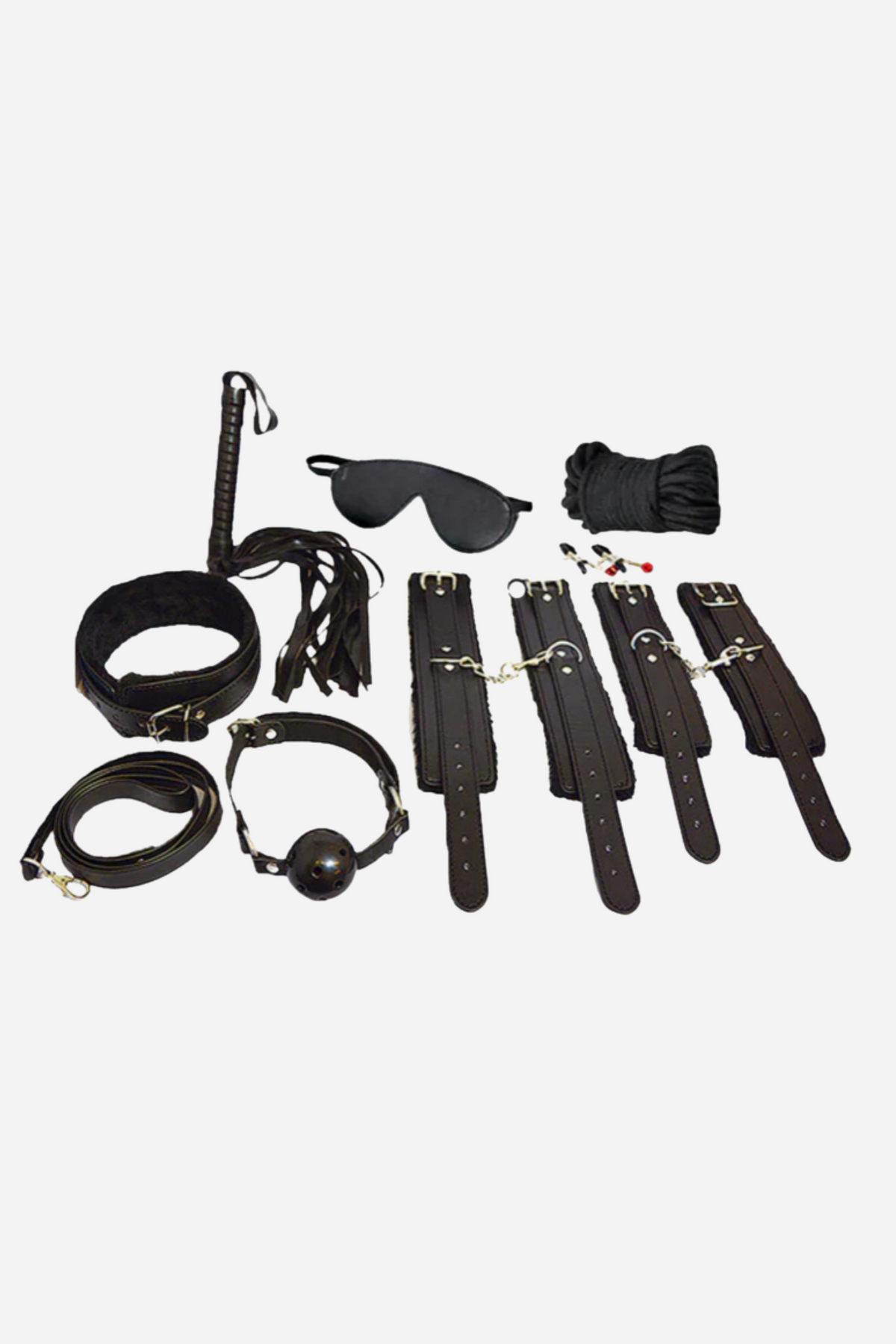 A black beginners bondage kit laid out flat: wrist and ankle cuffs, a collar and lead, a blindfold, a paddle, a crop and a feather tickler.