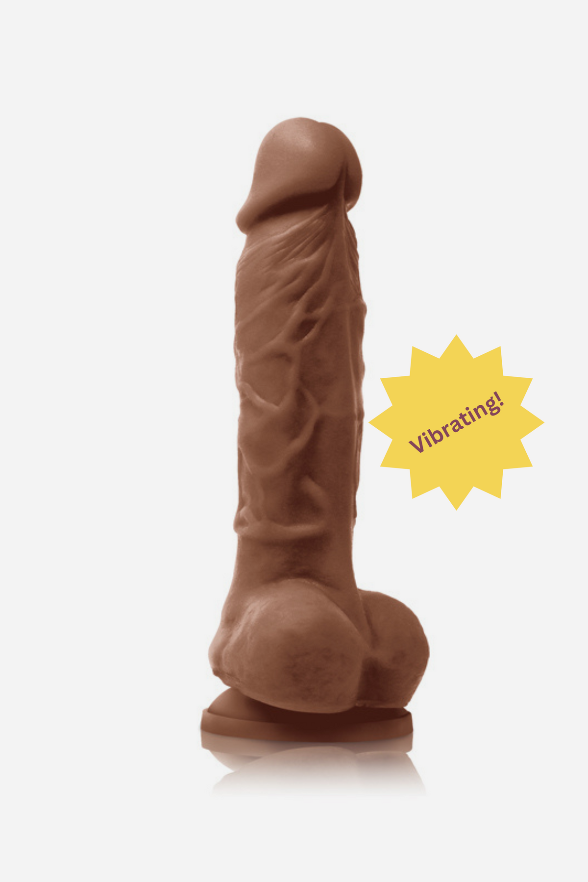 Pleasures 5 inch realistic vibrating dildo in caramel skin tone with lifelike veins, suction cup base and multi-speed vibration, shown on a grey background