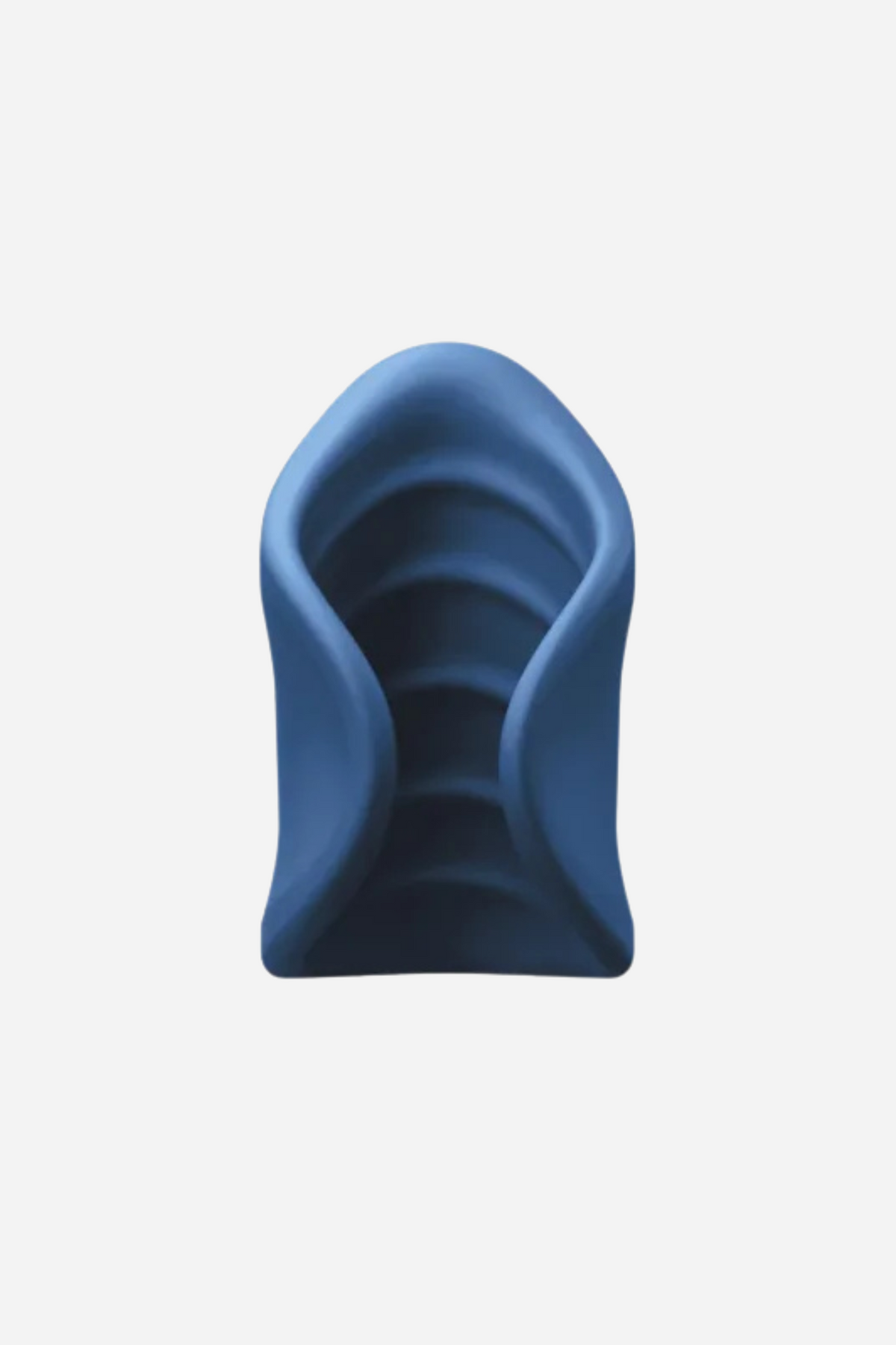 The navy stroker seen head-on, its ribbed internal channel visible through the open end, the sculpted blue silicone set on a plain grey backdrop.