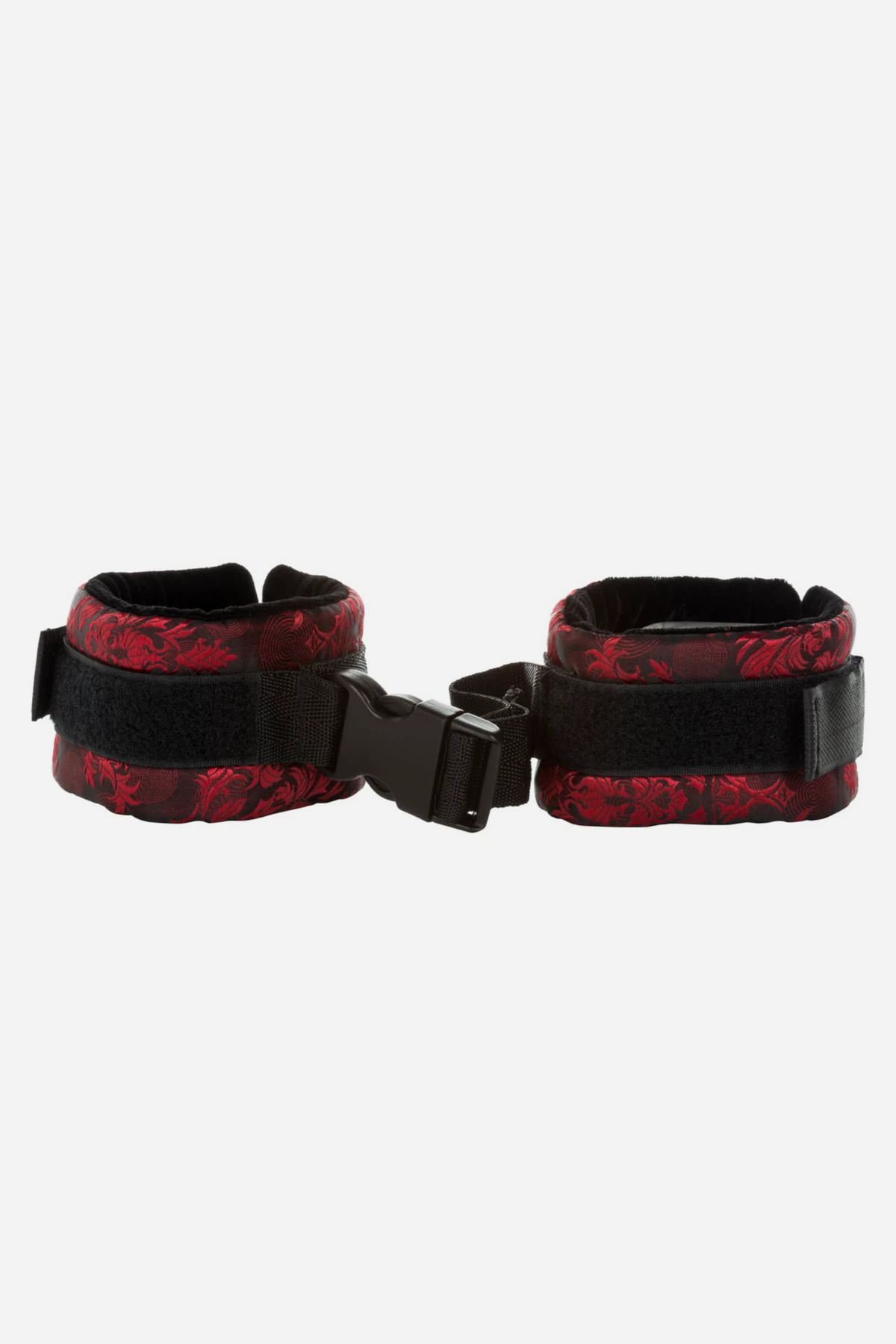 Pair of red and black Scandalous Brocade Cuffs lying flat, joined by the short adjustable strap and plastic quick-release buckle