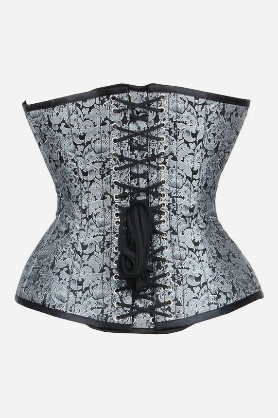 Back of the black and silver brocade Timeless overbust corset showing black laces crossed through two rows of grommets and a hanging lace tie