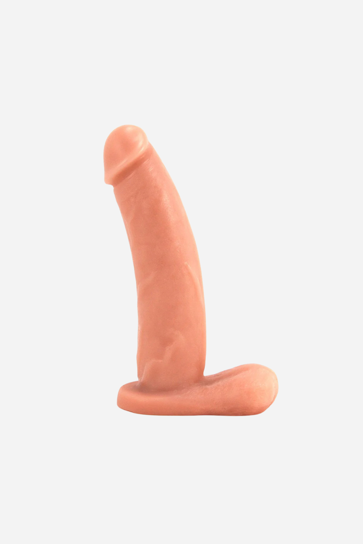 VixSkin Bandit dual density dildo in Vanilla, side view of the curved veined shaft and flared balls base on a light grey background