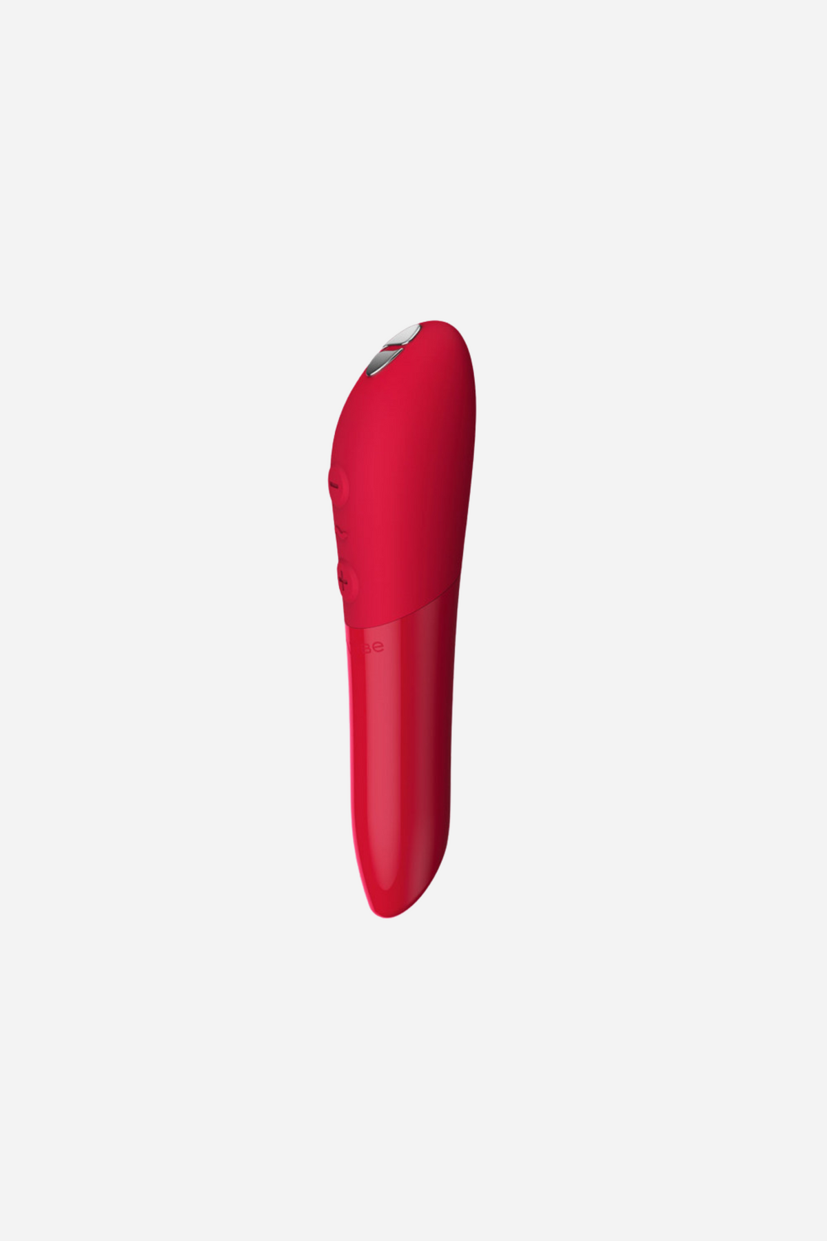 We-Vibe Tango X bullet vibrator in Cherry Red standing upright, showing its slim lipstick shape and angled tip on light grey