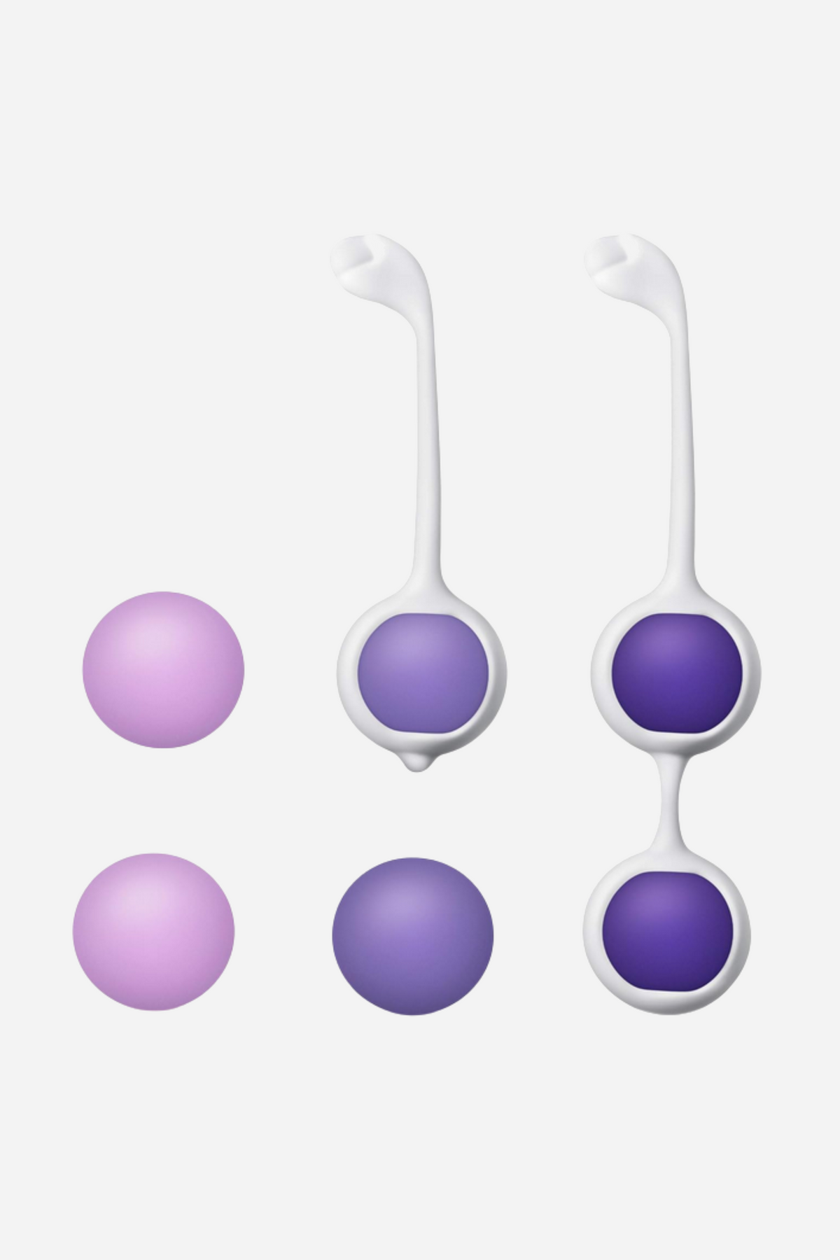 The full kegel set laid out on grey: two assembled double holders above, with the interchangeable purple and lilac weights in two rows below.