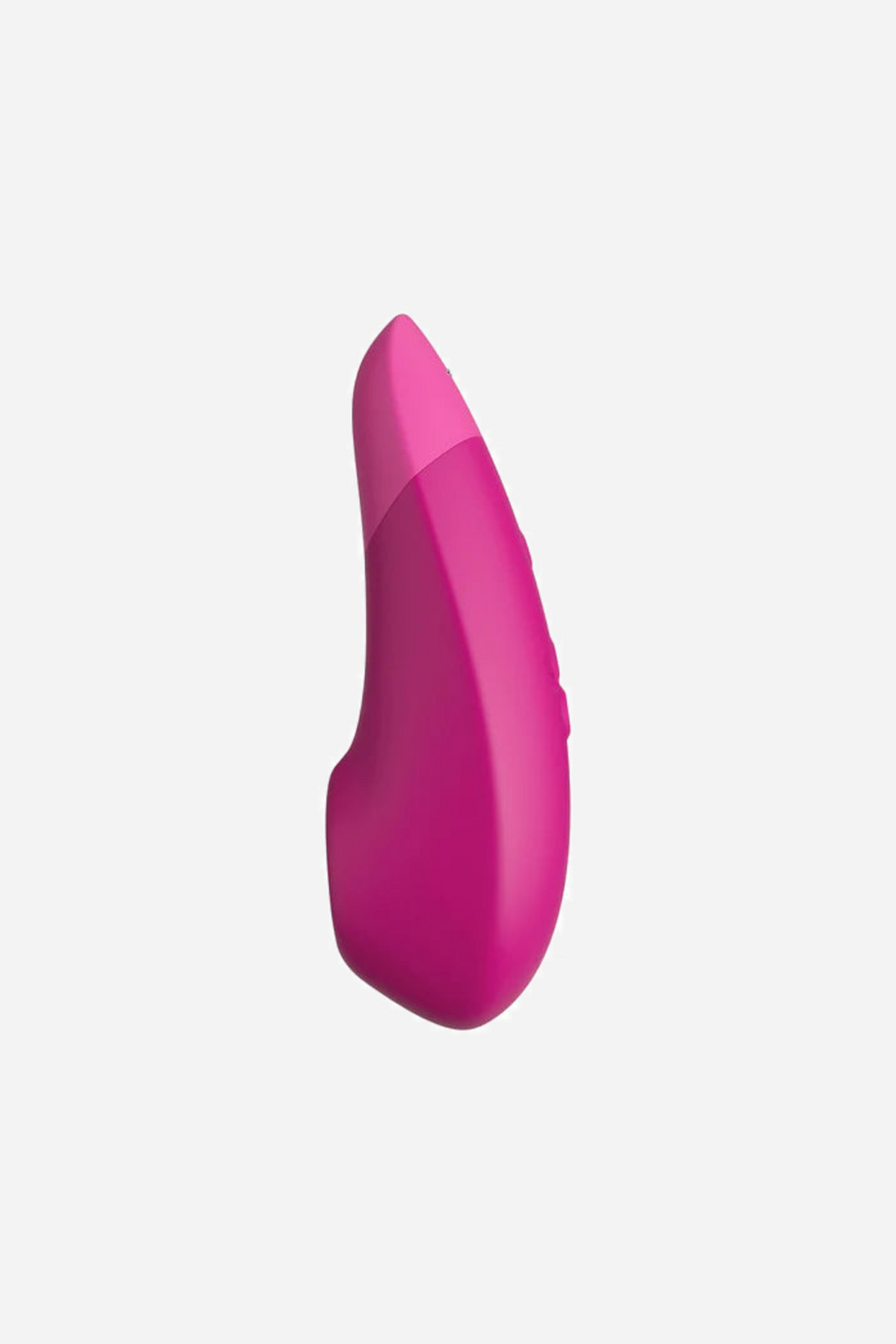 Side profile of the pink Womanizer Enhance, showing the slim tapered shape and the gentle curve from the tip down to the base