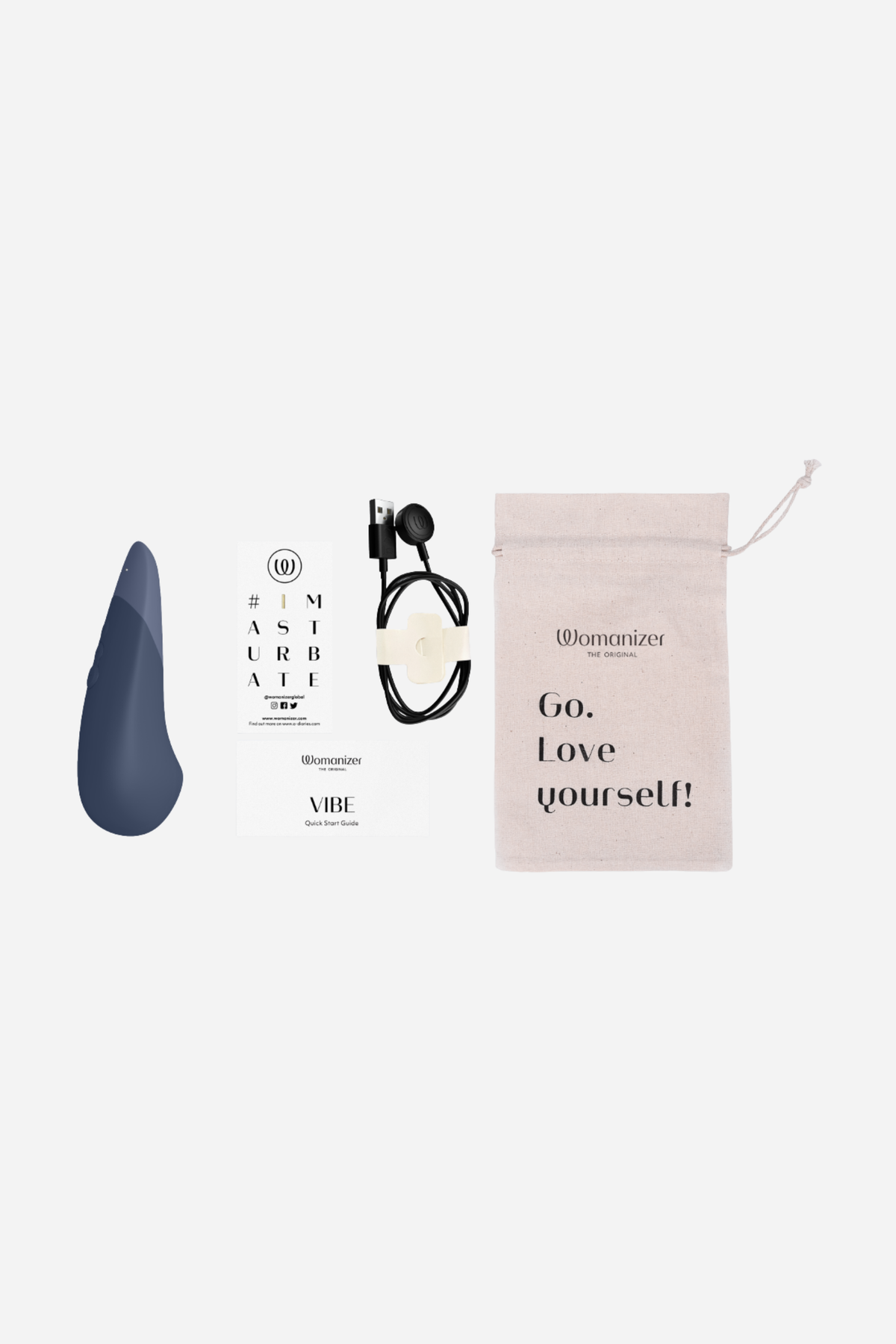 What's in the box: dark blue Womanizer Vibe, magnetic charging cable, instruction leaflets and a beige drawstring storage pouch on grey