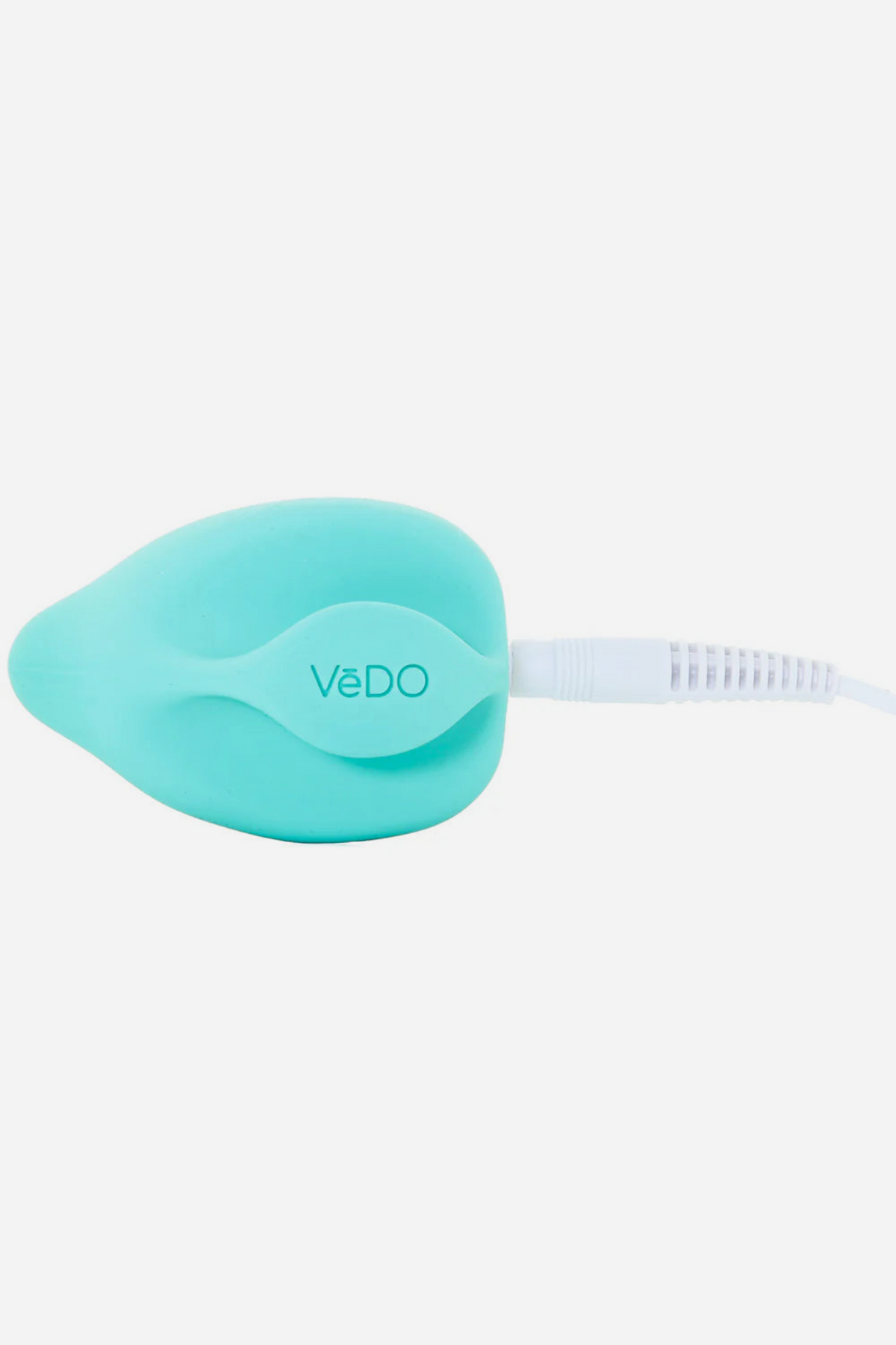 Turquoise Yummy Finger Vibe lying on its back with the USB charging cable connected to the charging port at the base of the toy