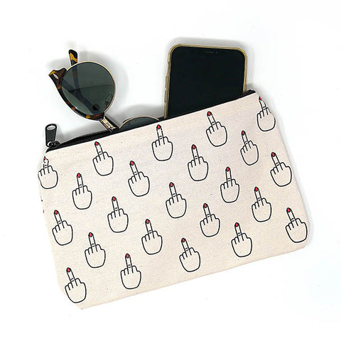 a neutral colored canvas pouch has screenprinted repeating images of a hand with the middle finger sticking up.  At the top of the bag partial sunglasses and a phone are sticking out slightly.