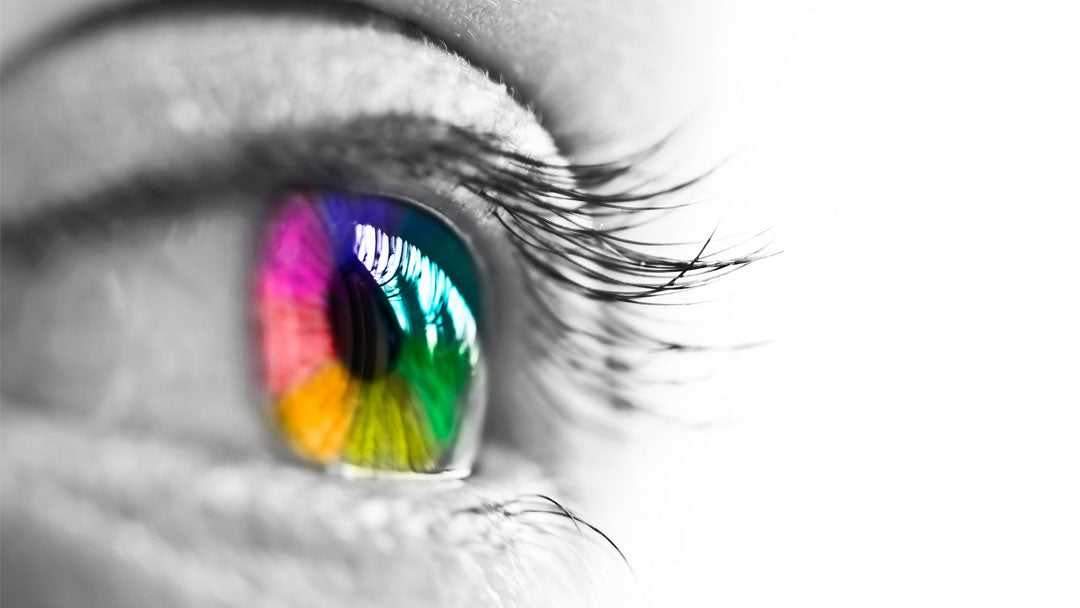 Black and white eye with queer rainbow iris