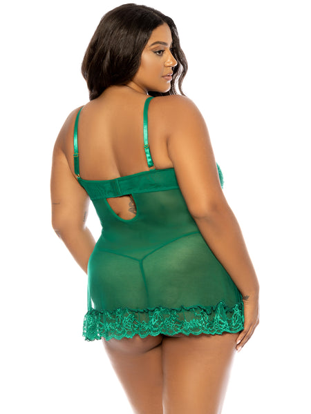 plus size black model shows off the see through mesh back of her bright green lingerie