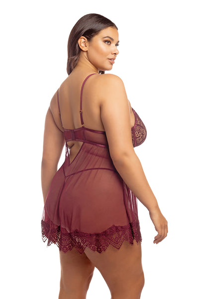 plus size lingerie model shows off the back of the see through mesh babydoll