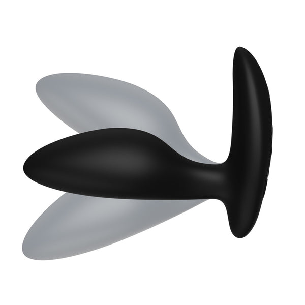 black silicone butt plug with shadows above and below the insertable end. meant to show that the plug is flexible