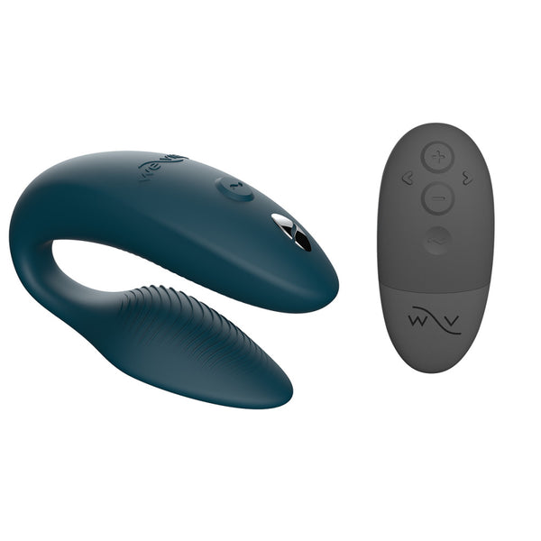c-shaped hands-free wearable vibrator in green velvet color and a black external remote