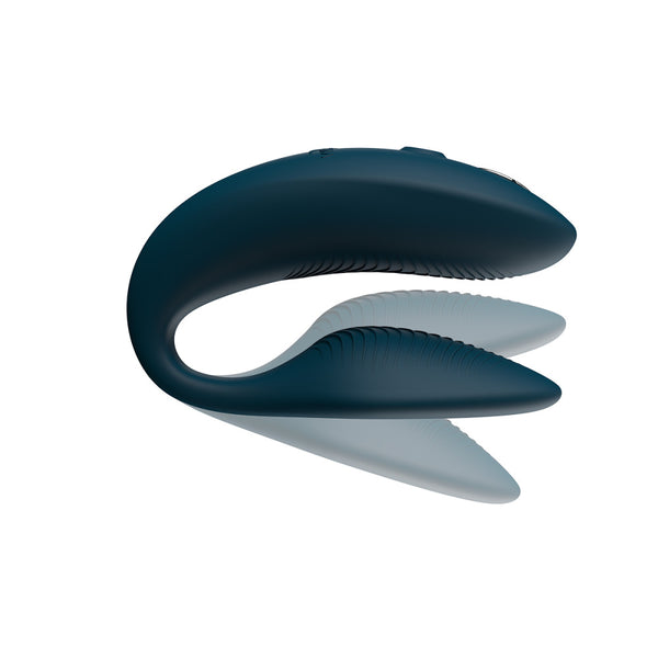 green velvet we-vibe sync 2 with shadows above and below the insertable end. meant to show that the toy is adjustable on the bottom, insertable arm