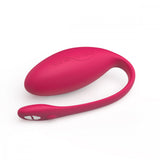 side view of Egg shaped hands-free wearable vibrator with tail for Bluetooth connectivity, in pink  