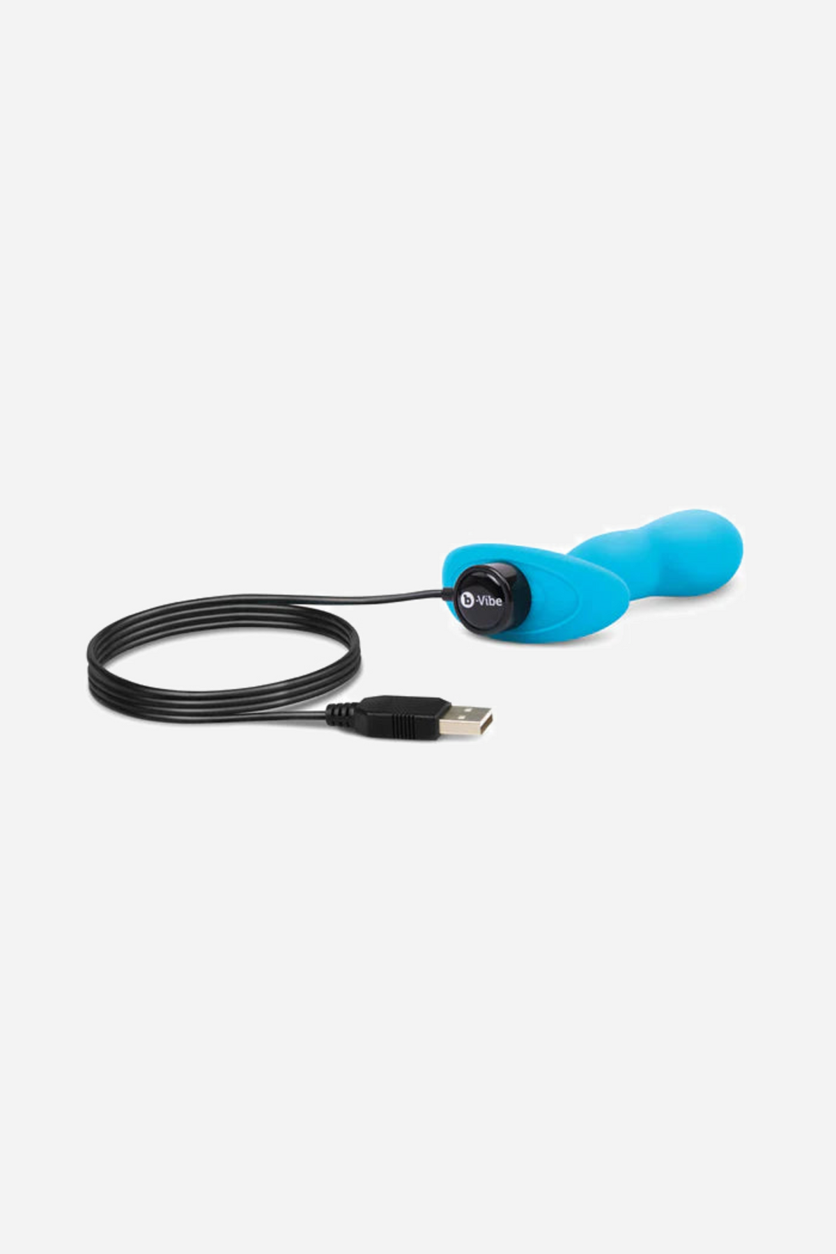 The teal plug attached to its magnetic USB charging cable