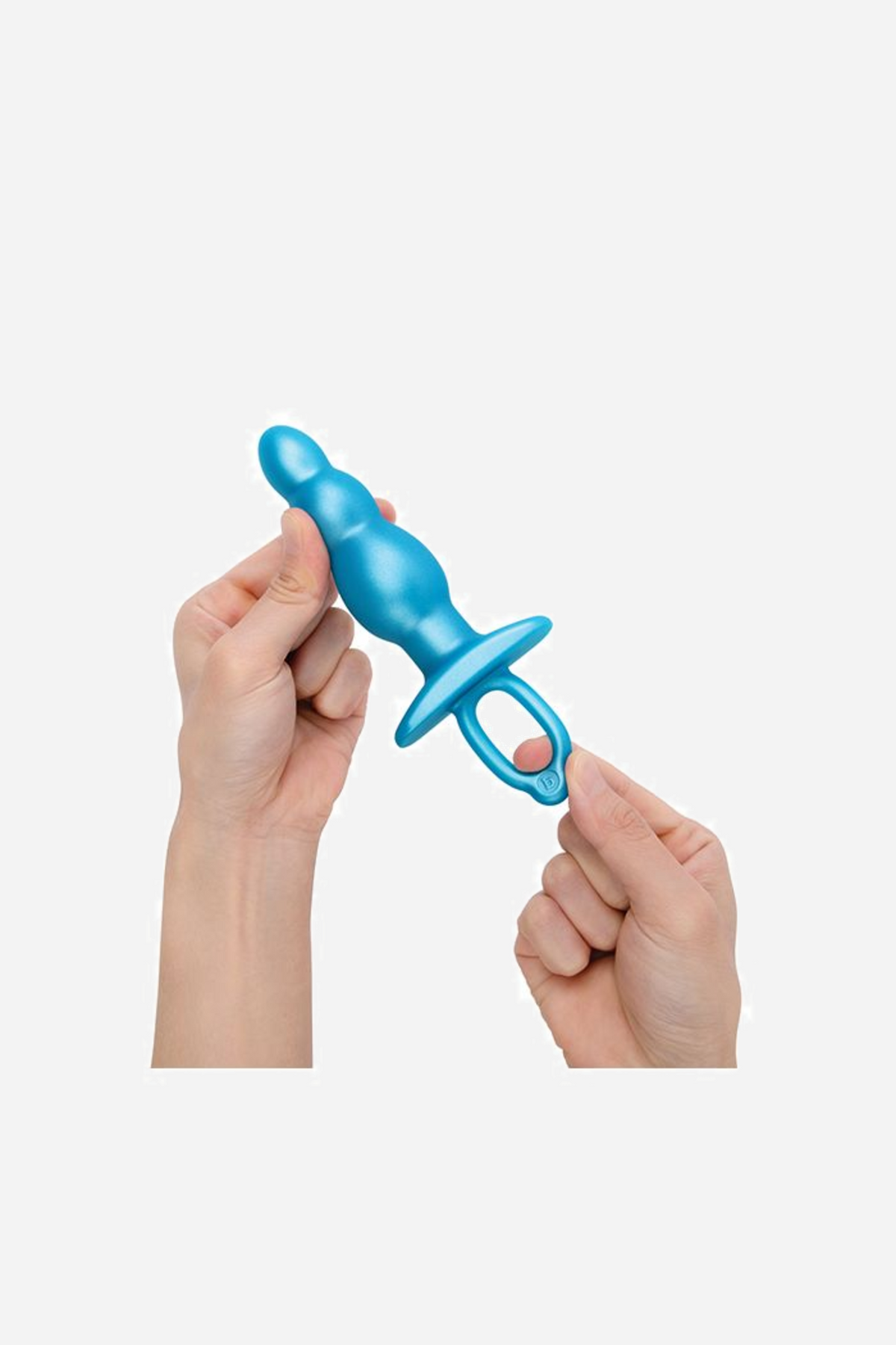 Two hands hold the blue Bounce plug at each end, bending it gently to show how flexible the silicone body is between the bulbs.